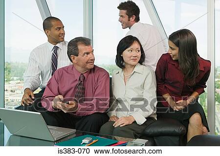 Businesspeople talking View Large Photo Image Stock Image - Businesspeople talking. Fotosearch