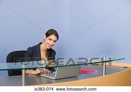 Businesswoman working View Large Photo Image Picture - Businesswoman working. Fotosearch