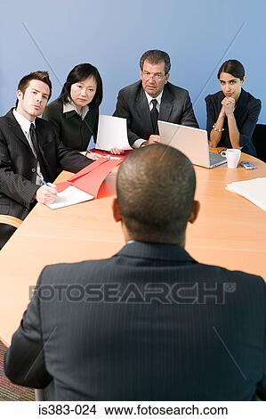 Colleagues in a meeting View Large Photo Image Picture - Colleagues in a meeting. Fotosearch