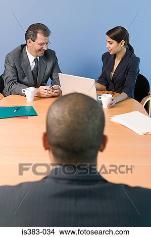 Colleagues in a meeting View Large Photo Image Picture - Colleagues in a meeting. Fotosearch