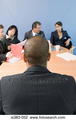 Colleagues in a meeting View Large Photo Image Stock Image - Colleagues in a meeting. Fotosearch
