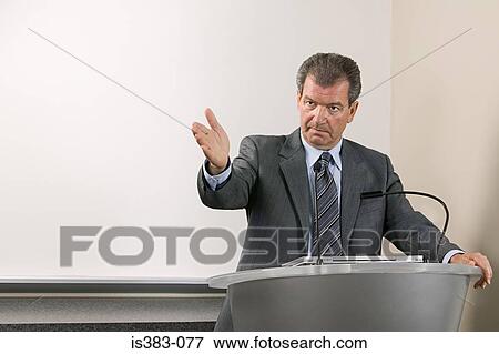Man giving presentation View Large Photo Image Stock Photo - Man giving presentation. Fotosearch