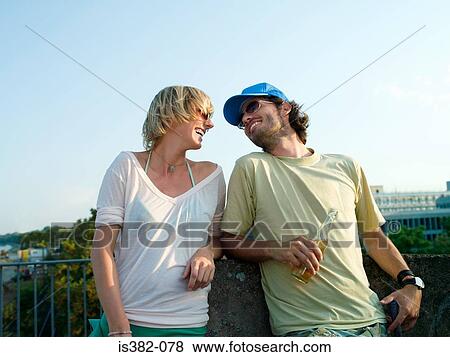 Carefree young couple View Large Photo Image Stock Photo - Carefree young couple. Fotosearch