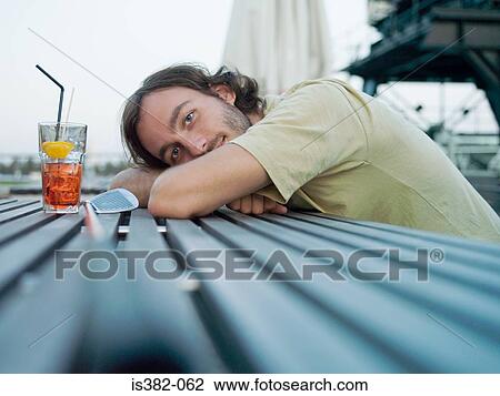 Golfer with a drink View Large Photo Image Stock Image - Golfer with a drink. Fotosearch