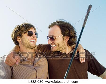 Stock Image - Happy male golfers. Fotosearch