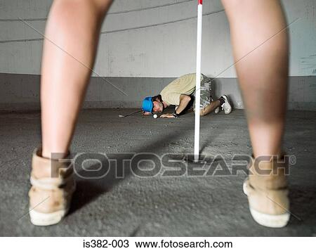 Legs of woman and man playing golf View Large Photo Image Stock Image - Legs of woman and man playing golf. Fotosearch