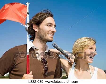 Stock Photo - Urban golf partners. Fotosearch