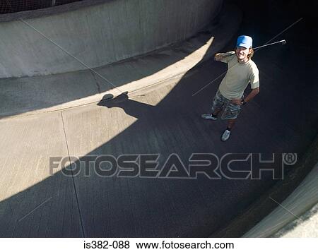 Young male urban golfer View Large Photo Image Stock Photo - Young male urban golfer. Fotosearch