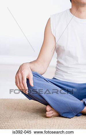 Man doing yoga View Large Photo Image Stock Photography - Man doing yoga. Fotosearch