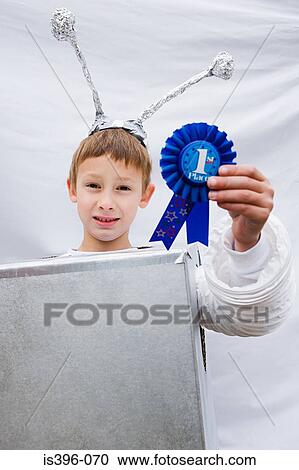 Boy in costume with winning rosette View Large Photo Image Stock Image - Boy in costume with winning rosette. Fotosearch
