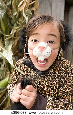 Girl dressed as a cat View Large Photo Image Stock Photo - Girl dressed as a cat. Fotosearch