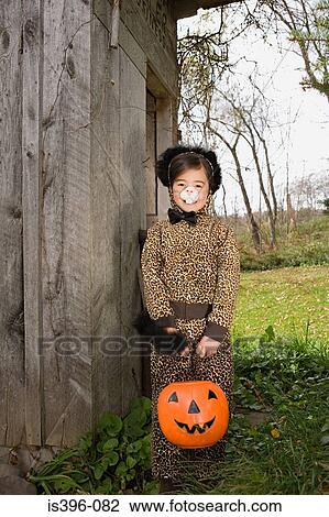 Girl in a cat costume View Large Photo Image Stock Image - Girl in a cat costume. Fotosearch