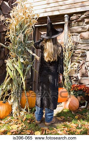 Girl trick or treating View Large Photo Image Stock Photography - Girl trick or treating. Fotosearch