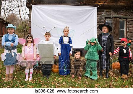 Kids in halloween costumes View Large Photo Image Stock Photo - Kids in halloween costumes. Fotosearch