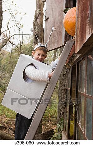 Robot boy on ladder View Large Photo Image Stock Image - Robot boy on ladder. Fotosearch