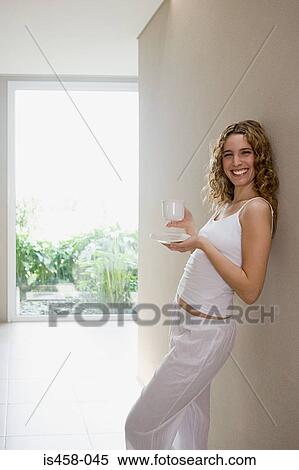 Woman holding teacup and saucer View Large Photo Image Stock Photography - Woman holding teacup and saucer. Fotosearch