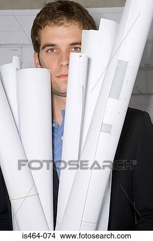 Architect with blueprints View Large Photo Image Picture - Architect with blueprints. Fotosearch