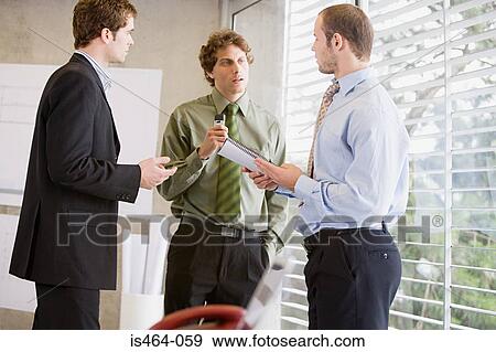 Businessmen having discussion View Large Photo Image Stock Photo - Businessmen having discussion. Fotosearch