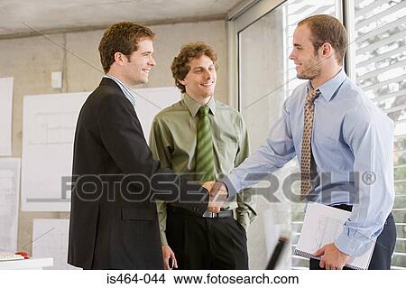 Businessmen shaking hands View Large Photo Image Picture - Businessmen shaking hands. Fotosearch