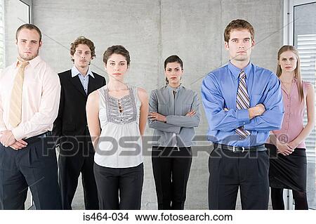 Serious office workers View Large Photo Image Picture - Serious office workers. Fotosearch