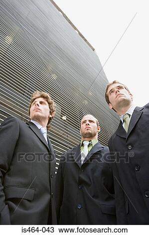 Serious young businessmen View Large Photo Image Stock Image - Serious young businessmen. Fotosearch