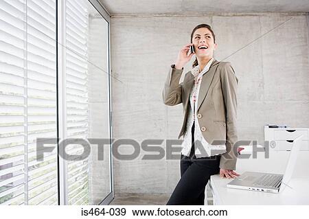 Woman on cellphone View Large Photo Image Stock Photo - Woman on cellphone. Fotosearch