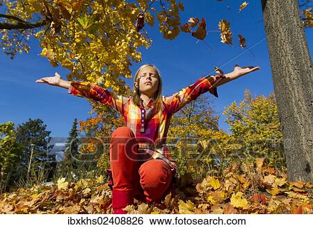 "10-year-old girl enjoying the sunny autumn weather, Berlin, Germany, Europe" View Large Photo Image Stock Photograph - "10-year-old girl enjoying the sunny autumn weather, Berlin, Germany, Europe". Fotosearch