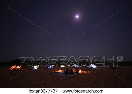 Stock Image - "A camp on the Tsiribihina River at night, Miandrivazo, Madagascar, Africa". Fotosearch