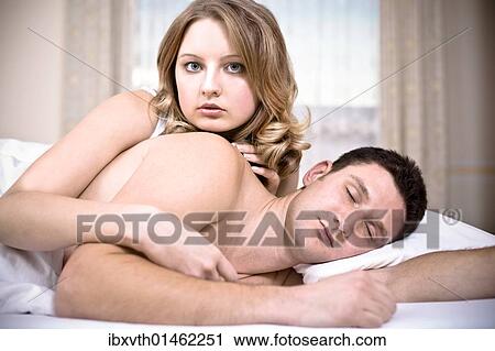 A couple in bed View Large Photo Image Stock Image - A couple in bed. Fotosearch