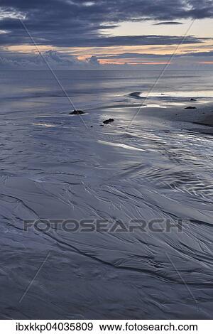Stock Photo - "A creek flowing into the North Sea, Skagerrak, Hirtshals, Denmark, Europe". Fotosearch