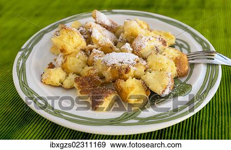 Stock Photo - "A plate of Kaiserschmarren pancakes, dessert, Austria, Europe". Fotosearch