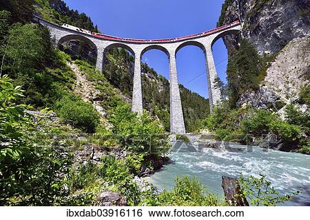 "A train of the Rhaetian Railway on the Landwasser Viaduct, UNESCO World Heritage Site, near Filisur, Canton of Grisons, Switzerland, Europe" View Large Photo Image Stock Photograph - "A train of the Rhaetian Railway on the Landwasser Viaduct, UNESCO World Heritage Site, near Filisur, Canton of Grisons, Switzerland, Europe". Fotosearch