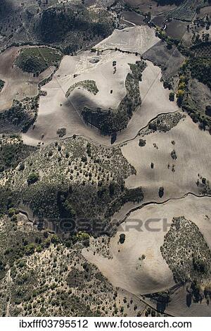 "Aerial view, barren landscape in the Sierra de Cadiz, Andalusia, Spain, Europe" View Large Photo Image Stock Image - "Aerial view, barren landscape in the Sierra de Cadiz, Andalusia, Spain, Europe". Fotosearch