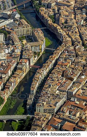 Picture - "Aerial view, Call, Jewish quarter on the river Onyar, Girona, Catalonia, Spain, Europe". Fotosearch