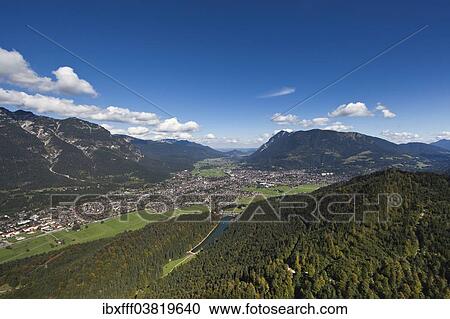 "Aerial view, Garmisch-Partenkirchen, Riessersee, Mt Wank, Wetterstein Range, Loisachtal Valley, Werdenfelser Land Region, Bayerisches Oberland, Bavaria, Germany, Europe" View Large Photo Image Stock Image - "Aerial view, Garmisch-Partenkirchen, Riessersee, Mt Wank, Wetterstein Range, Loisachtal Valley, Werdenfelser Land Region, Bayerisches Oberland, Bavaria, Germany, Europe". Fotosearch