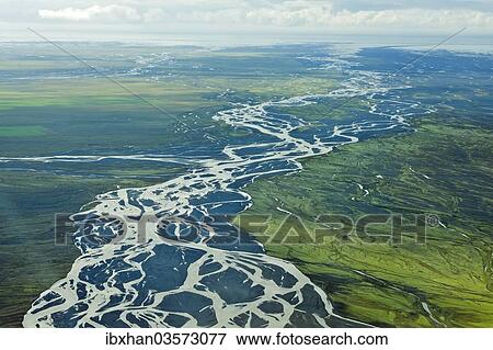 "Aerial view, glacial river meandering over the sandy surface of the Skeioararsandur desert plain, Vatnajoekull and Skaftafell National Park, Southern Region, Iceland, Europe" View Large Photo Image Stock Photo - "Aerial view, glacial river meandering over the sandy surface of the Skeioararsandur desert plain, Vatnajoekull and Skaftafell National Park, Southern Region, Iceland, Europe". Fotosearch