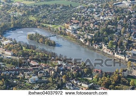Stock Image - "Aerial view, Grosser Teich lake with an island zoo, Altenburg, Thuringia, Germany, Europe". Fotosearch
