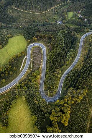 "Aerial view, hairpin curves, winding road in the Sauerland forests, between Herscheid and Halver, North Rhine-Westphalia, Germany, Europe" View Large Photo Image Picture - "Aerial view, hairpin curves, winding road in the Sauerland forests, between Herscheid and Halver, North Rhine-Westphalia, Germany, Europe". Fotosearch