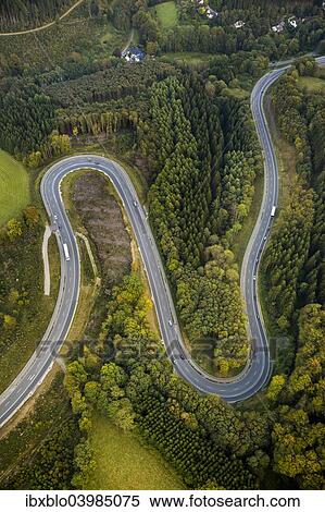 "Aerial view, hairpin curves, winding road in the Sauerland forests, between Herscheid and Halver, North Rhine-Westphalia, Germany, Europe" View Large Photo Image Stock Photography - "Aerial view, hairpin curves, winding road in the Sauerland forests, between Herscheid and Halver, North Rhine-Westphalia, Germany, Europe". Fotosearch
