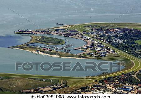"Aerial view, harbour of Norderney with ferry pier, Wadden Sea, Norderney, island in the North Sea, East Frisian Islands, Lower Saxony, Germany, Europe" View Large Photo Image Stock Photo - "Aerial view, harbour of Norderney with ferry pier, Wadden Sea, Norderney, island in the North Sea, East Frisian Islands, Lower Saxony, Germany, Europe". Fotosearch