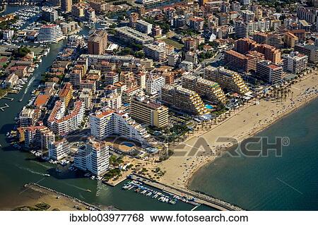 "Aerial view, high-rise buildings, holiday resort on the beach, Roses, Golf de Roses, Catalonia, Spain, Europe" View Large Photo Image Stock Photo - "Aerial view, high-rise buildings, holiday resort on the beach, Roses, Golf de Roses, Catalonia, Spain, Europe". Fotosearch
