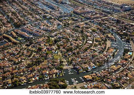 "Aerial view, holiday homes with moorings and canals, Marina of Empuriabrava, Ampuriabrava, Catalonia, Spain, Europe" View Large Photo Image Stock Image - "Aerial view, holiday homes with moorings and canals, Marina of Empuriabrava, Ampuriabrava, Catalonia, Spain, Europe". Fotosearch