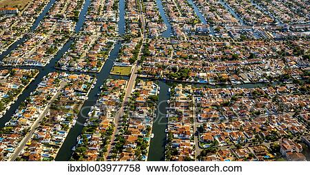 "Aerial view, holiday homes with moorings and canals, Marina of Empuriabrava, Ampuriabrava, Catalonia, Spain, Europe" View Large Photo Image Stock Photo - "Aerial view, holiday homes with moorings and canals, Marina of Empuriabrava, Ampuriabrava, Catalonia, Spain, Europe". Fotosearch