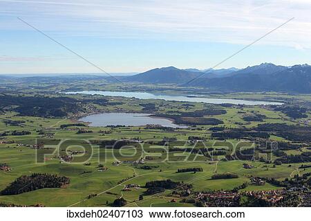 "Aerial view, Hopfensee lake in front of Forggensee lake in Ostallgaeu, Allgaeu, Bavaria, Germany, Europe" View Large Photo Image Stock Image - "Aerial view, Hopfensee lake in front of Forggensee lake in Ostallgaeu, Allgaeu, Bavaria, Germany, Europe". Fotosearch