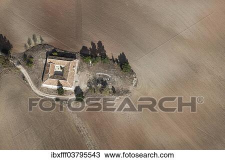 Stock Image - "Aerial view, house with fields in the Sierra de Cadiz, Andalusia, Spain, Europe". Fotosearch