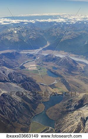 Stock Photo - "Aerial view, Lake Pearson, Lake Grasmere, Lake Sarah and the Waimakariri River, Canterbury Region, New Zealand, Oceania". Fotosearch