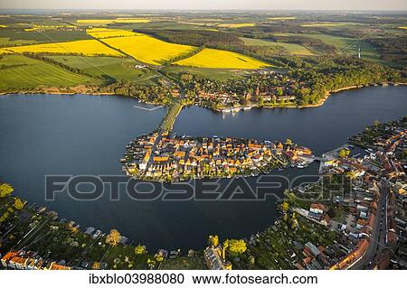 "Aerial view, Malchow with Malchower See lake and the island with the historic centre and its old market square, Malchow, Mecklenburg Lake District, Mecklenburg-Western Pomerania, Germany, Europe" View Large Photo Image Stock Image - "Aerial view, Malchow with Malchower See lake and the island with the historic centre and its old market square, Malchow, Mecklenburg Lake District, Mecklenburg-Western Pomerania, Germany, Europe". Fotosearch
