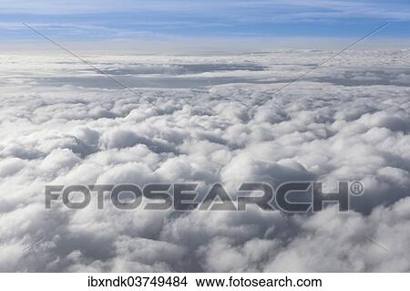 Aerial view of a white blanket of clouds View Large Photo Image Picture - Aerial view of a white blanket of clouds. Fotosearch