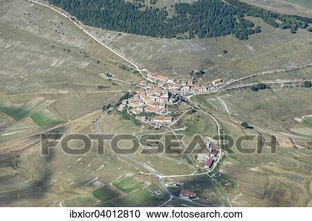 "Aerial view of Piano Grande plateau and village of Castelluccio di Norcia, Monti Sibillini National Park, Umbria, Italy, Europe" View Large Photo Image Stock Image - "Aerial view of Piano Grande plateau and village of Castelluccio di Norcia, Monti Sibillini National Park, Umbria, Italy, Europe". Fotosearch