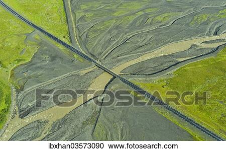 "Aerial view of Ring Road No. 1 with a bridge crossing a tributary of the Skaftafellsa glacial river, Southern Region, Iceland, Europe" View Large Photo Image Stock Image - "Aerial view of Ring Road No. 1 with a bridge crossing a tributary of the Skaftafellsa glacial river, Southern Region, Iceland, Europe". Fotosearch